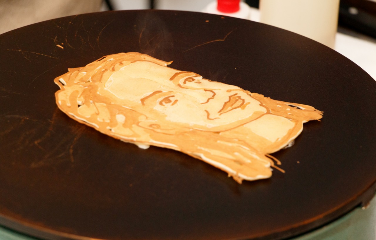 Pfannkuchengesicht wird fotografiert